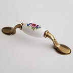 Puxador Metal e Porcelana Branca Floral 76mm - C1424