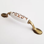 Puxador Metal e Porcelana Branca Des Dourado 96mm - C1427