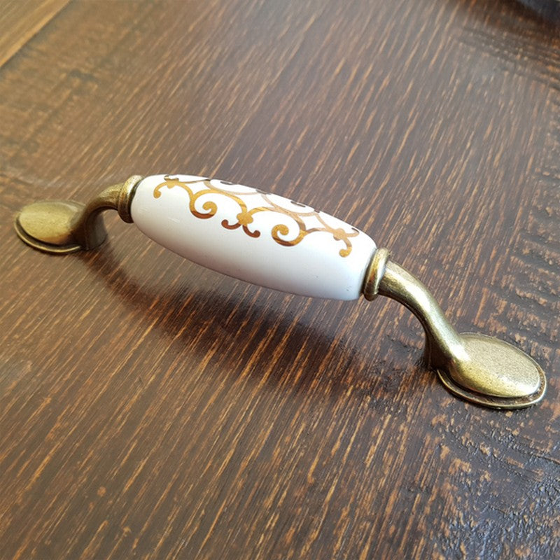 Puxador Metal e Porcelana Branca Des Dourado 96mm - C1427