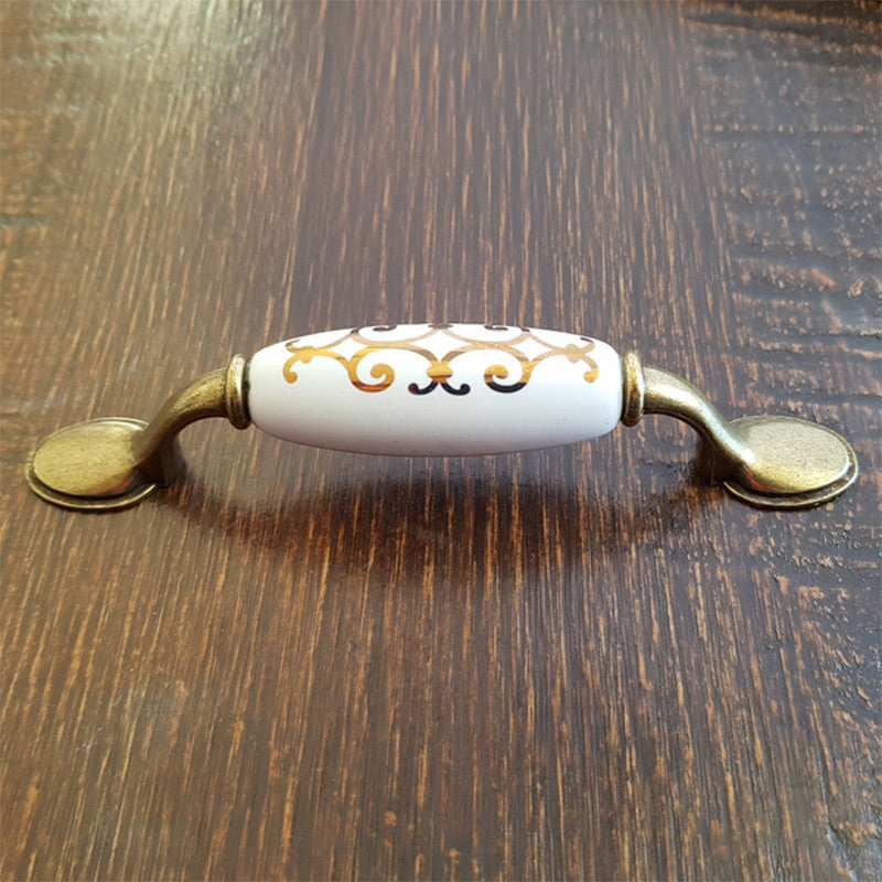 Puxador Metal e Porcelana Branca Des Dourado 96mm - C1427