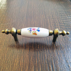 Puxador Metal e Porcelana Branca Floral 76mm - C1430