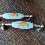 Puxador Metal e Porcelana Branca Floral 96mm - C1432