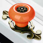 Puxador Gaveta Armário Porcelana Redondo Laranja Base Metal 73mm - C1489