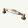 Puxador Metal Bronze Antigo e Porcelana Branca Floral 96mm - C1549
