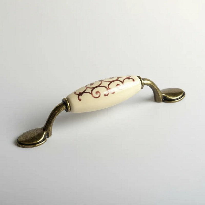 Puxador Metal e Porcelana Marfim Des Dourado 96mm - C1574