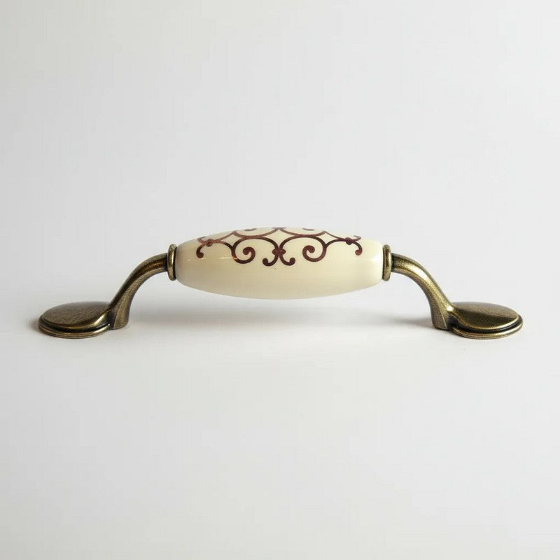 Puxador Metal e Porcelana Marfim Des Dourado 96mm - C1574